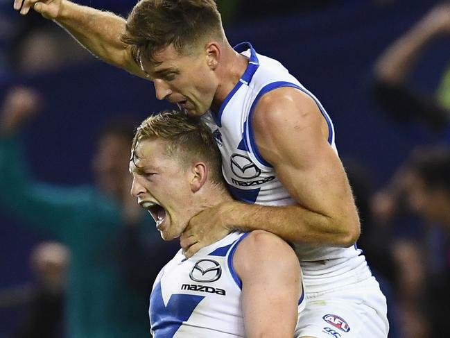 MELBOURNE, AUSTRALIA - JUNE 23:  Jack Ziebell of the Kangaroos celebrates kicking the match winning goal during the round 14 AFL match between the Western Bulldogs and the North Melbourne Kangaroos at Etihad Stadium on June 23, 2018 in Melbourne, Australia.  (Photo by Quinn Rooney/Getty Images)