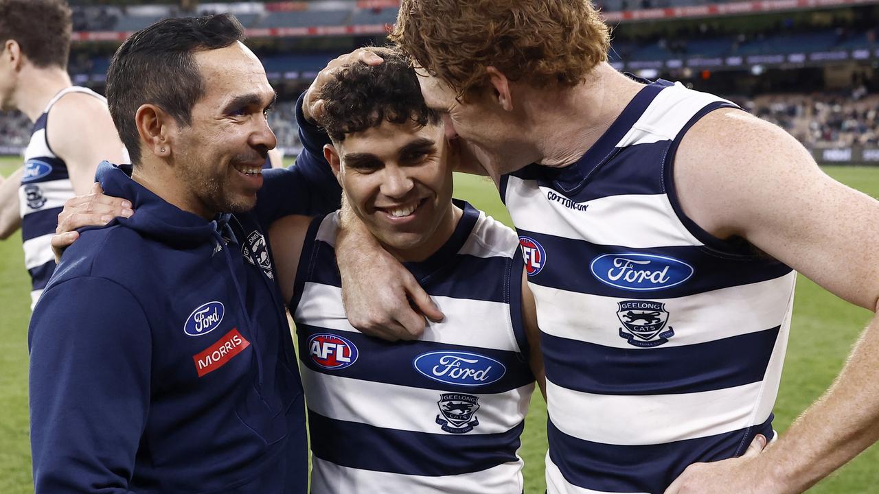 Geelong Cats assistant Eddie Betts celebrates the preliminary final win with Tyson Stengle and Gary Rohan. Picture: Darrian Traynor