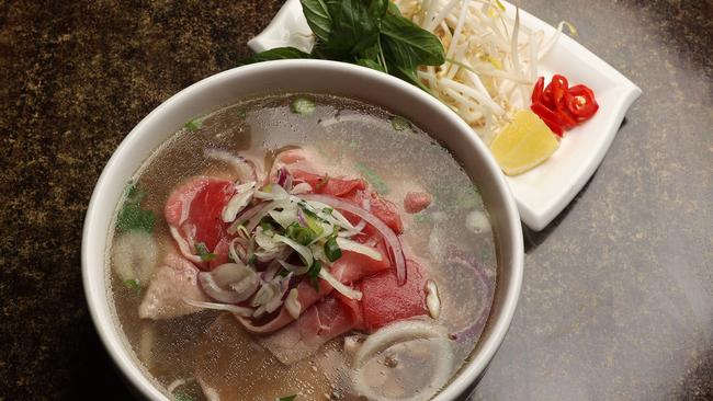 The rare beef pho at Ca Phe Nam, West End. Picture: Liam Kidston