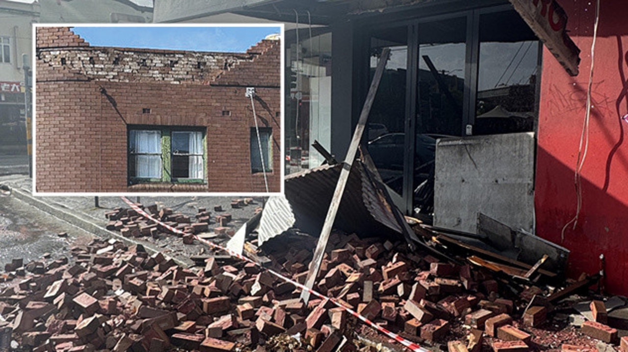 Bricks and iron rain onto inner-Sydney footpath as roof collapses