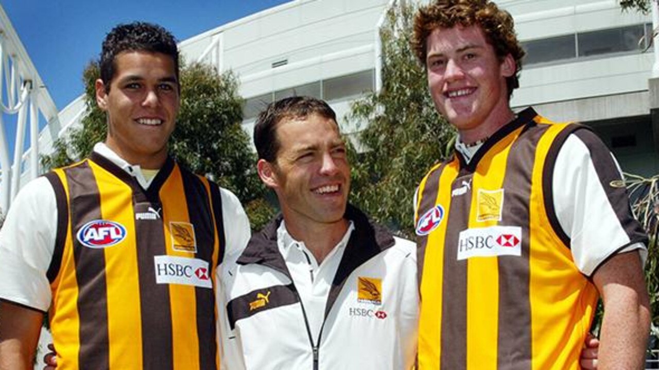 20/11/2004 SPORT: Hawthorn coach Alastair Clarkson with his first two draft picks, Jarryd Roughead and Lance Franklin. AFL DRAFT 2004.