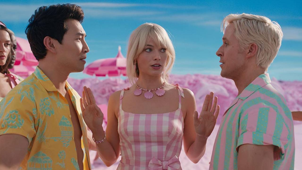 Simu Liu and Ryan Gosling as versions of Ken alongside Margot Robbie.