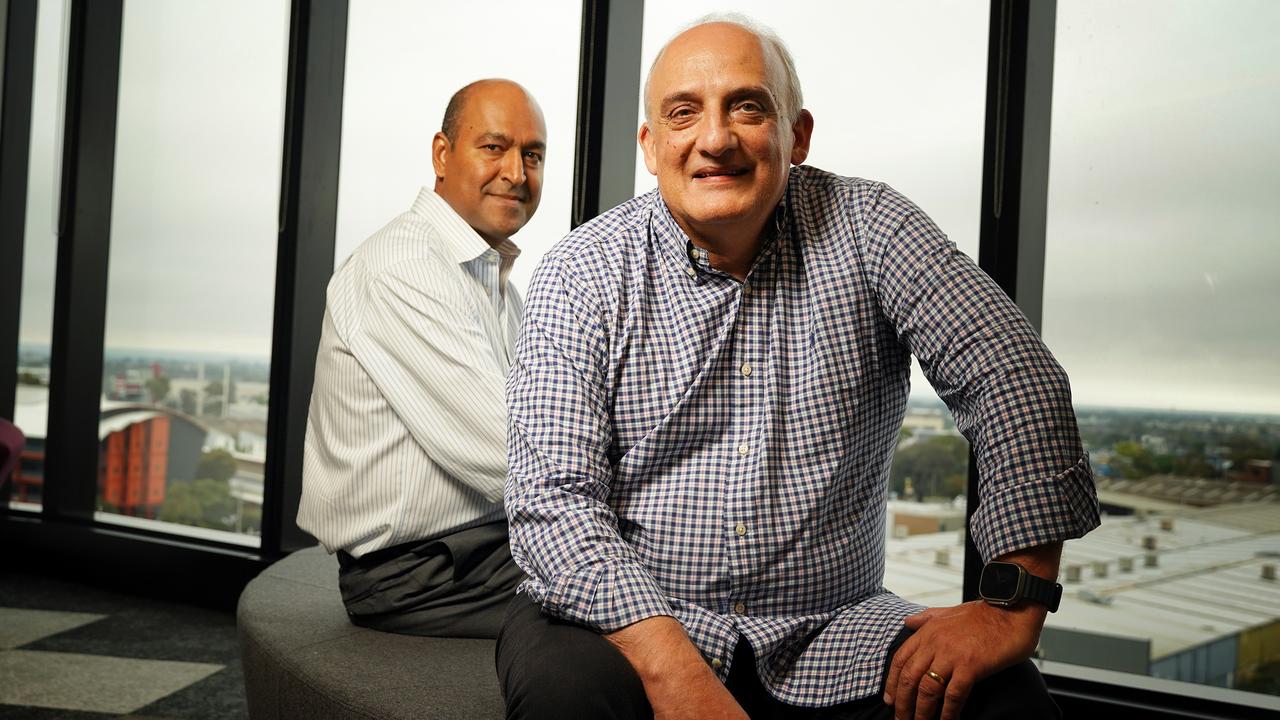 Chemist Warehouse co-founder Mario Verrocchi with Sigma boss Vikesh Ramsunder. Picture: Luis Enrique Ascui/NCA NewsWire
