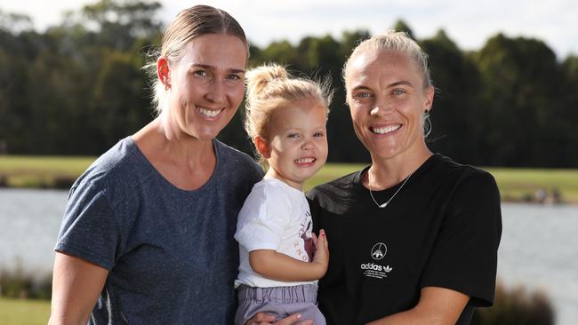 Matildas star Tameka Yallop (right) on the Gold Coast with her wife Kirsty and their daughter Harley. Picture Glenn Hampson