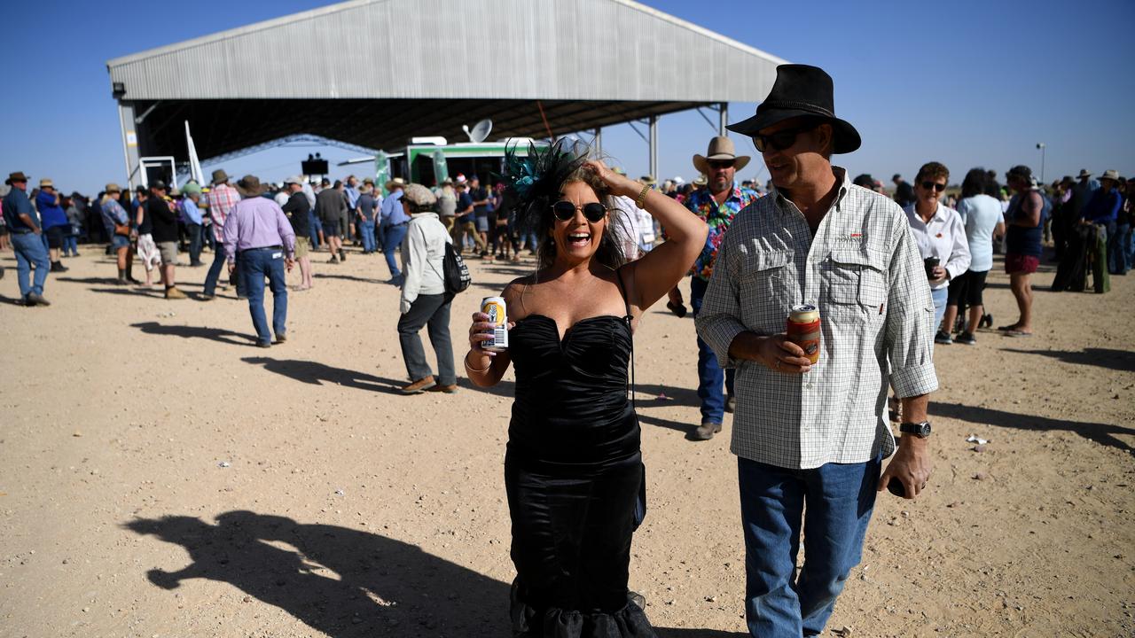 Racegoers enjoy themselves at the Birdsville Races in Birdsville, Picture: AAP Image/Dan Peled