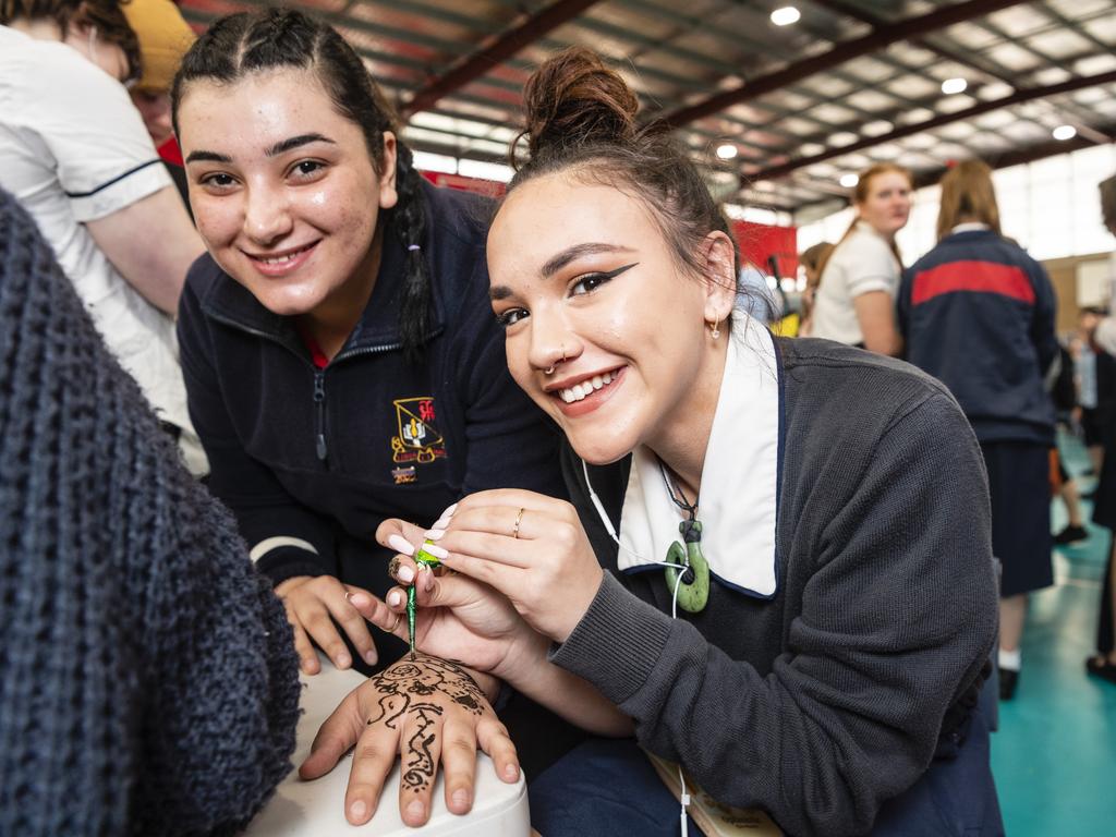 At the Amnesty stall are Toowoomba State High School students Shahrspan Khalaf (left) and Halle Knopfler at the TSHS Mental Health Expo, Friday, October 14, 2022. Picture: Kevin Farmer