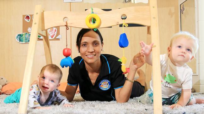 Manju Rai, educator at Pelicans in the Park, with Kyton Pitcher and Finn Meaden. Picture: Justin Brierty