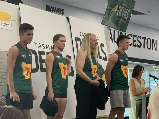 Junior players showcase Tasmania Football Club's jersey they will wear in the AFL. Picture: Jon Tuxworth