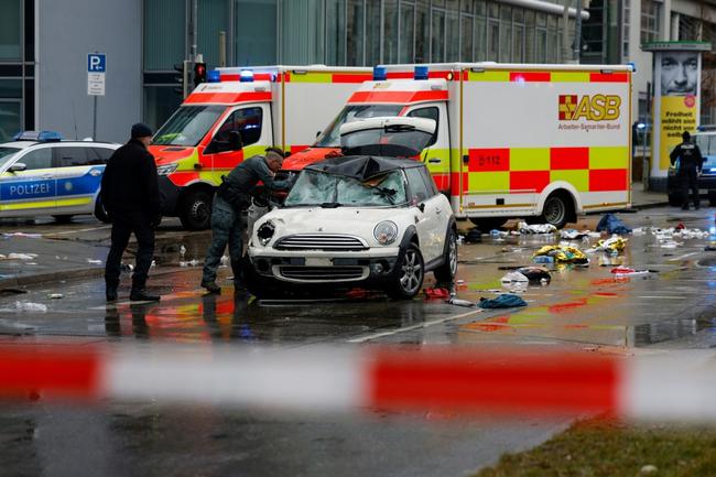 Emergency services at the scene where a car drove into a crowd in the southern German city of Munich, leaving several people injured