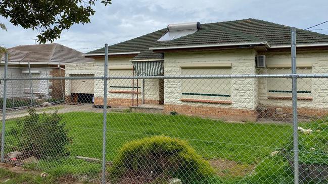 The state opposition has identified several empty fenced-off homes on the same street at Clovelly Park. Picture: Supplied