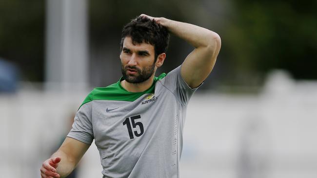 Socceroos training at Olympic Park.Mile Jedinak walked laps Picture:Wayne Ludbey