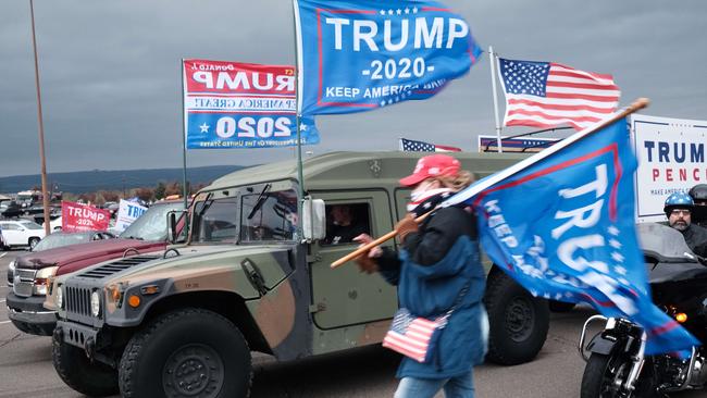 Supporters of President Donald Trump participate in a car and motorcycle rally in Wilkes-Barre, Pennsylvania. Picture: Getty Images