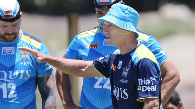 Gold Coast Titans training at Parkwood. Coach Neil Henry speaks to the players..Picture Glenn Hampson