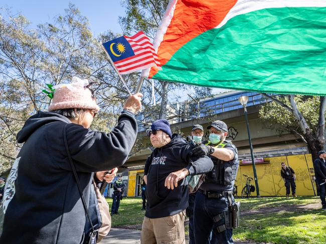 Anti-war activists attempt to disrupt the Land Forces expo. Picture: Jake Nowakowski