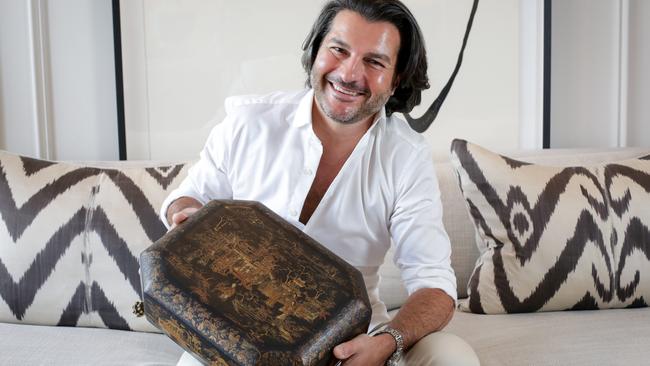 Interior designer, Marco Meneguzzi with a favourite item, an 18th century lacquered box. Picture: Liam Driver