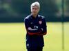 Arsenal manager Arsene Wenger, pauses, during a training session with his team, in London Colney, Hertfordshire, Wednesday May 14, 2014. Arsenal are playing Hull City in the FA Cup final on Saturday. (AP Photo/PA, David Davies) UNITED KINGDOM OUT NO SALES NO ARCHIVE