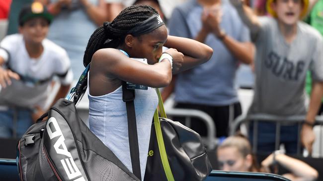 An emotional Coco Gauff walks off the court after a three-set loss to fellow American Sofia Kenin at the Australian Open. Picture: AFP