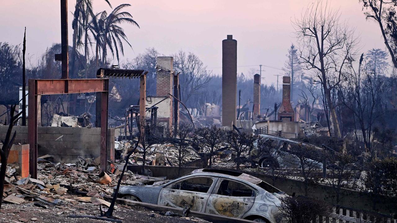 Chimneys stand among the rubble after the passage of the Palisades Fire. Picture: AGUSTIN PAULLIER / AFP