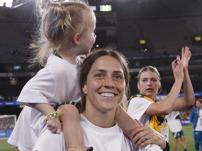 Katrina Gorry and daughter Harper after the Matildas’ 10-0 win. Picture:Darrian Traynor/Getty Images