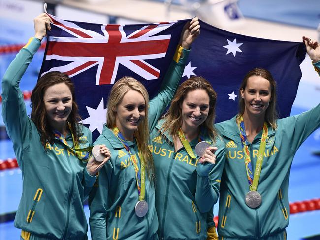 Emily Seebohm, Taylor McKeown, Emma McKeon, Cate Campbell pose with their silver medals after the 4 x 100m Medley Relay Final at Rio. Picture: AFP