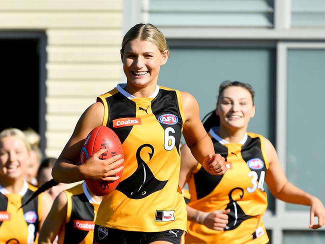 Zoe Besanko of the Stingrays leads her team out onto the field during the round eleven Coates Talent League Girls match between the Dandenong Stingrays and the Bendigo Pioneers at Shepley Oval, on June 22, 2024, in Melbourne, Australia. (Photo by Josh Chadwick)