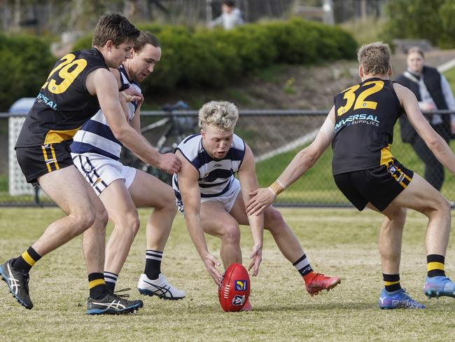 Chelsea’s Brayden Chapple picks up the ball. Picture: Valeriu Campan