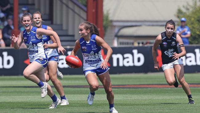 North Melbourne's Ashleigh Riddell running with the ball. Picture: LUKE BOWDEN