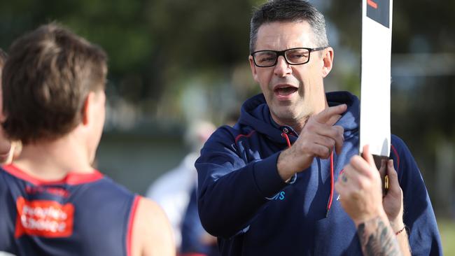 Norwood coach Jade Rawlings addresses his charges against Central District on Saturday. Picture: SANFL Image / David Mariuz