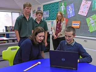 The Premier sits with Leon Noble as he skypes his tutor, while Matt York, Charlie Maunder and principal Melissa Graham watch on. Picture: Alexia Austin