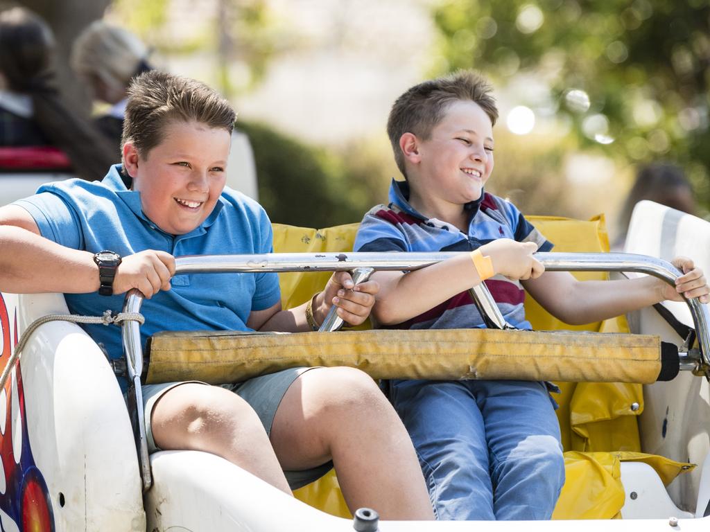 Having fun on a show ride are Hunter Ryrie (left) and Chett Smith at Fairholme College Spring Fair, Saturday, October 21, 2023. Picture: Kevin Farmer