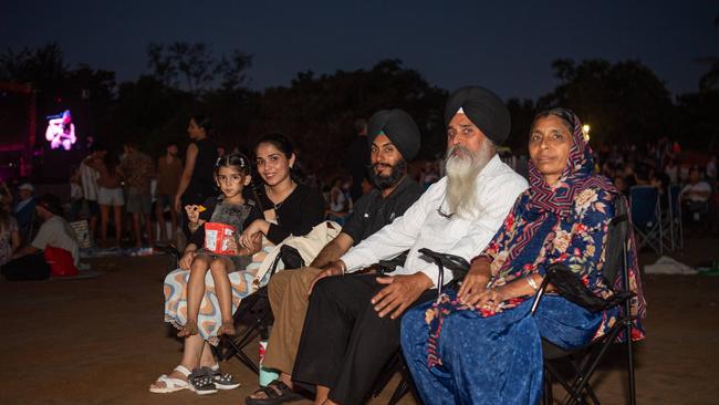 Singhs Family waits for the fireworks at Territory Day celebrations at Mindil Beach, Darwin. Picture: Pema Tamang Pakhrin