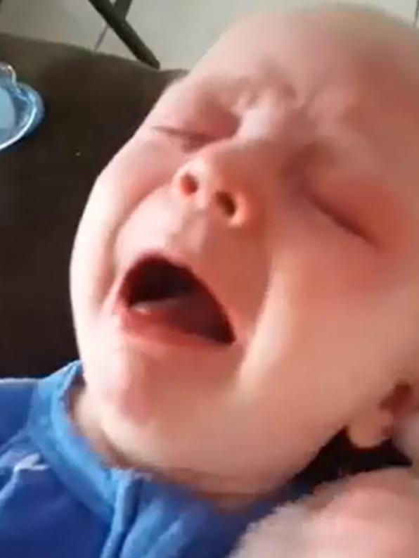 The reality of anti-vax nonsense: Austin Harreman’s mum posted a video of him in the terrible throes of whooping cough. (Pic: Supplied)