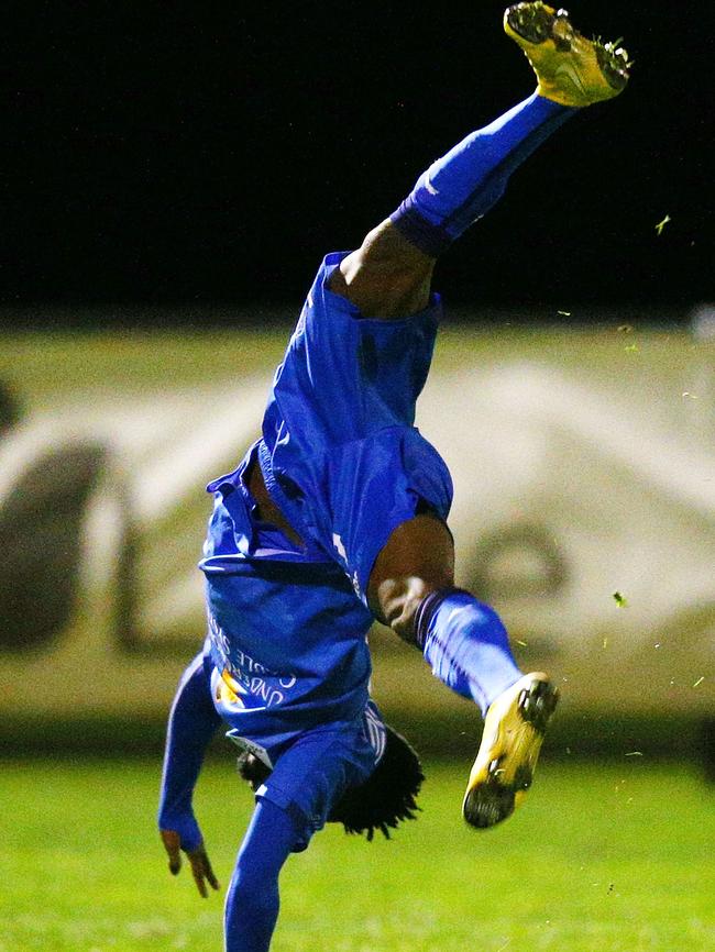 Elvis Kamsoba acrobatically celebrates his goal against Devonport Strikers. Picture: Getty Images.