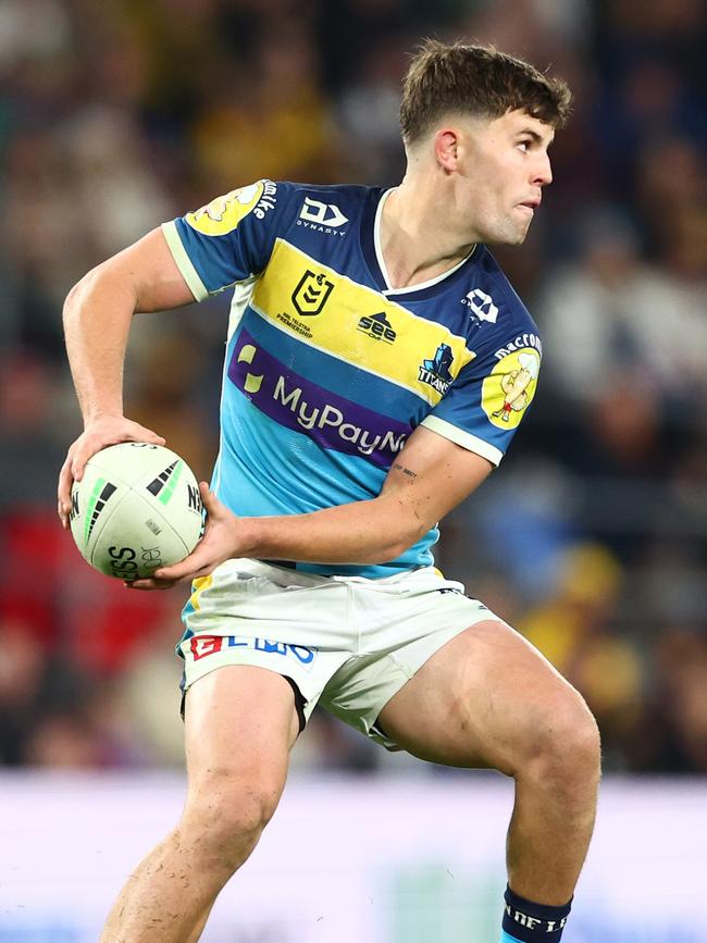 Toby Sexton of the Titans passes during the round 18 NRL match between the Gold Coast Titans and the Brisbane Broncos at Cbus Super Stadium, on July 16, 2022, in Gold Coast, Australia. (Photo by Chris Hyde/Getty Images)