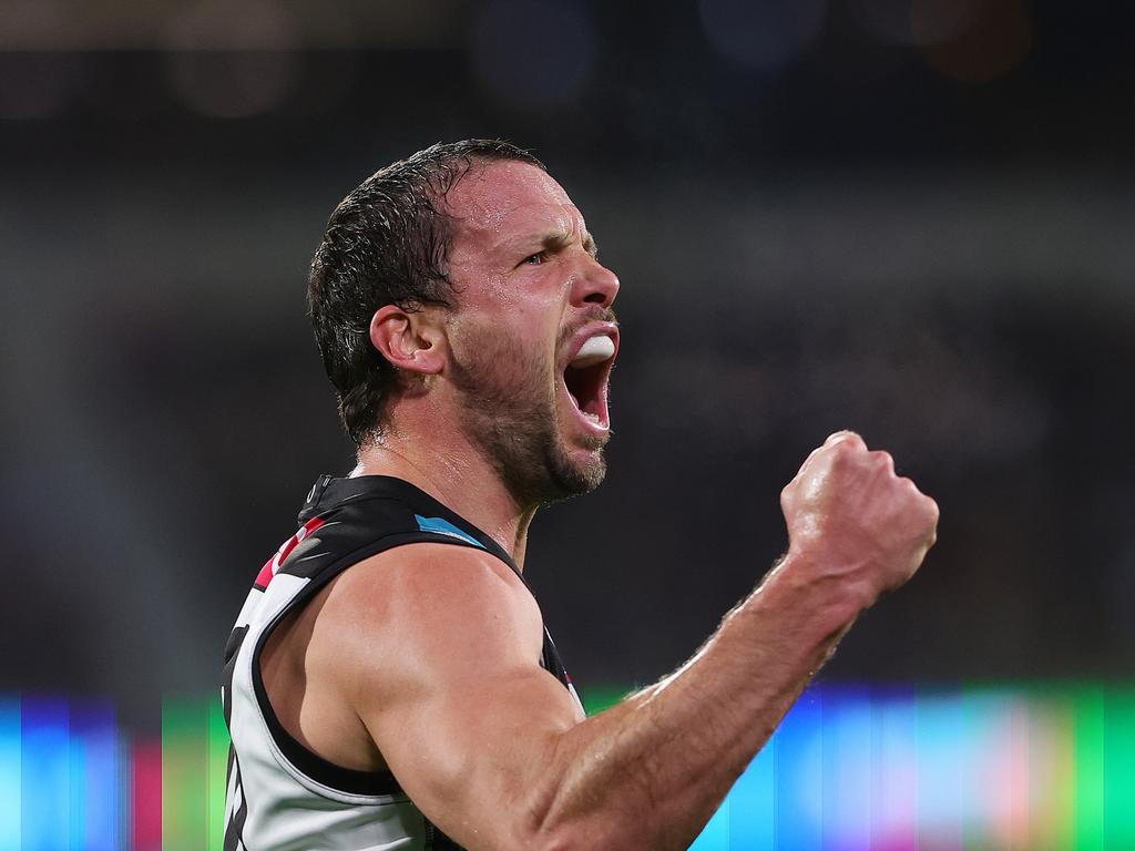 Travis Boak tries to fire up the home crowd. Picture: Sarah Reed/AFL Photos via Getty Images