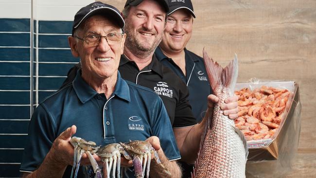 Maurice with his sons Matthew and Damian Cappo at Cappo Seafood at the Adelaide Central Marke. Picture: Matt Loxton