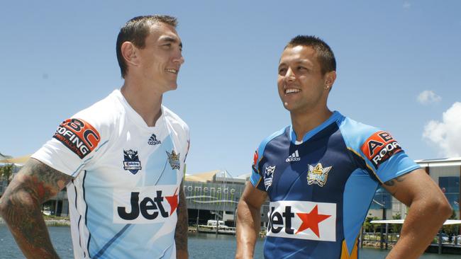 Mat Rogers, left, and Scott Prince model the Titans' jerseys for the 2010 season.