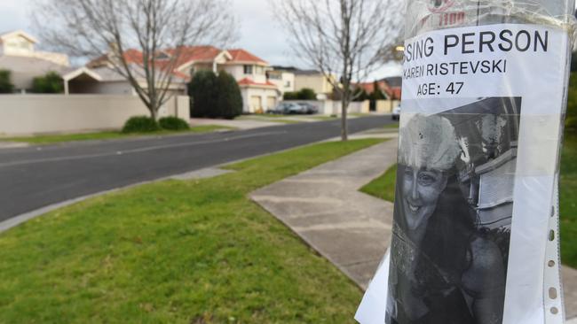 A Missing Person poster for Karen Ristevski posted on a light pole near her family home.