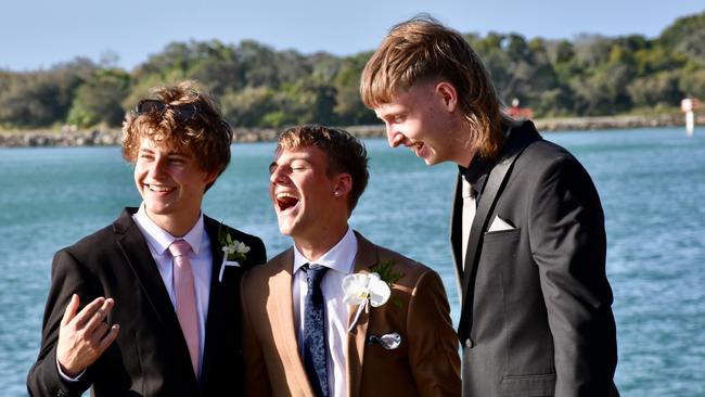 Suncoast Christian College students and parents gather at La Balsa Park for photos ahead of the formal at The Events Centre, Caloundra.