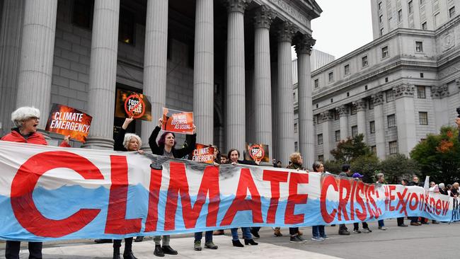 Climate activists protest outside the New York State Supreme Court building in New York City.