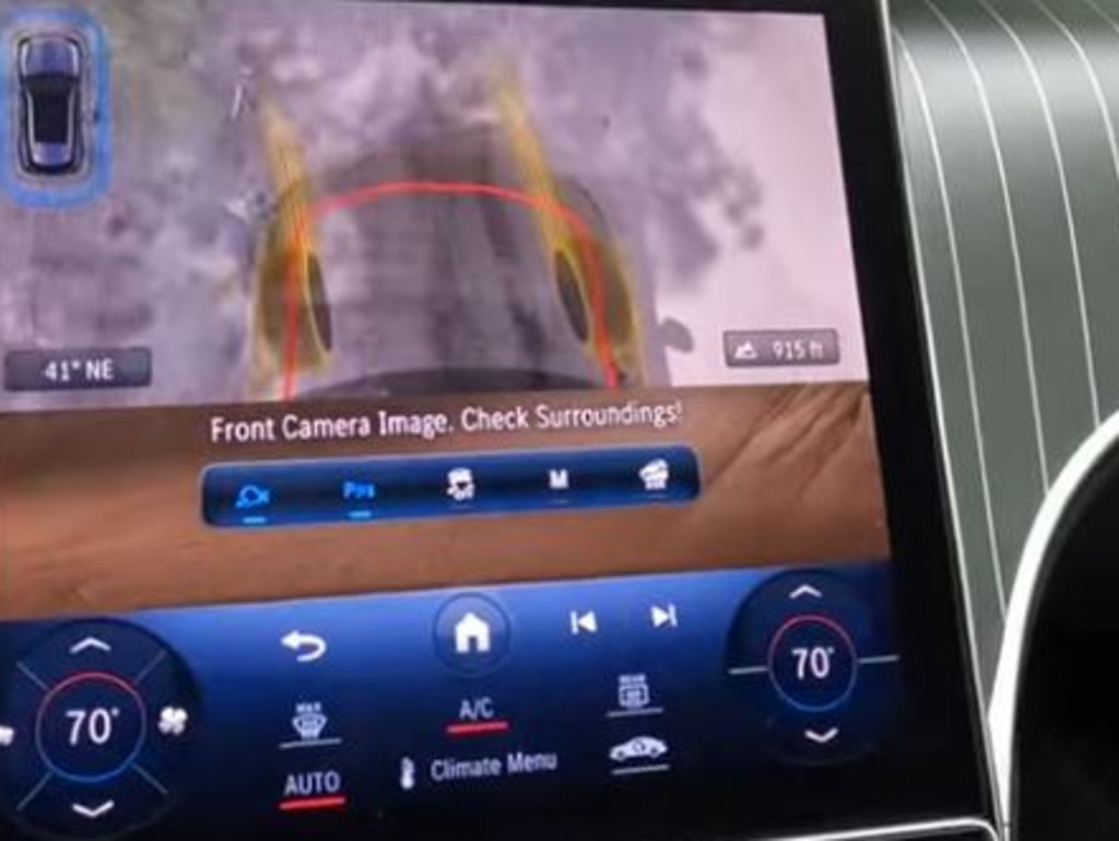 One of the standout features is its ‘transparent bonnet’ – a clever camera system that uses views from the front and side mirror to give drivers a virtual image of what’s beneath the front of the car.