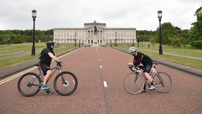 Two cyclists meet at Stormont in Belfast, Northern Ireland. Picture: Getty Images