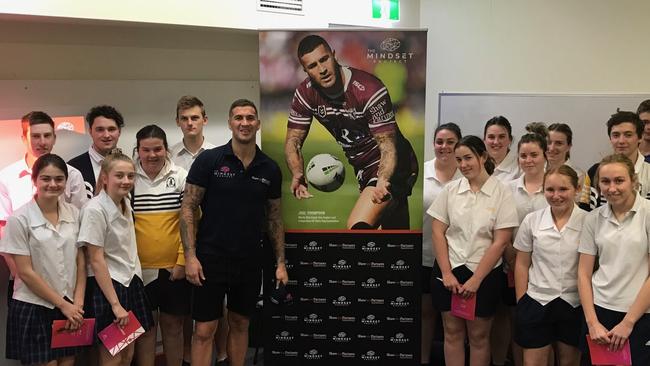 Joel Thompson on a school visit to discuss mental health.