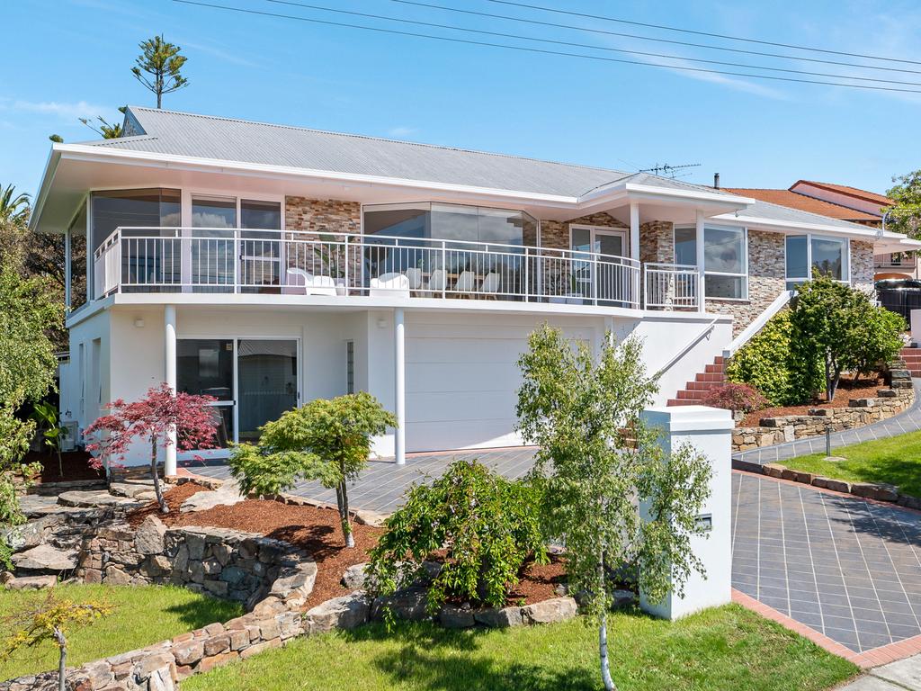 No.56 Wells Pde Blackmans Bay is listed with Knight Frank at "Offers over $1.35m".