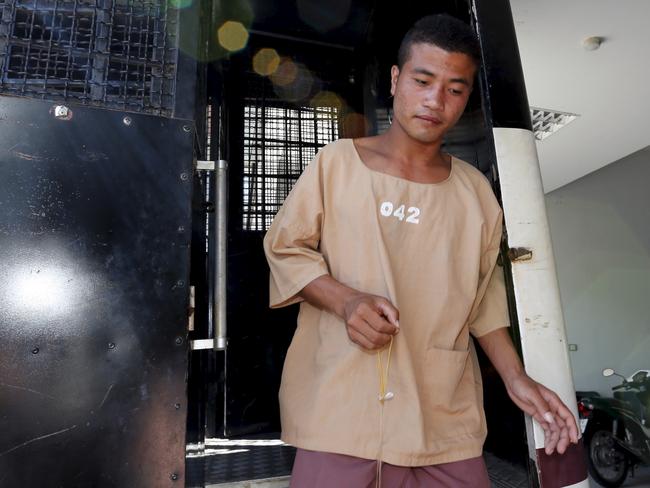 Myanmar migrant worker Wai Phyo, also known as Win Zaw Htun, arrives at the Koh Samui Provincial Court, in Koh Samui, for court last July.