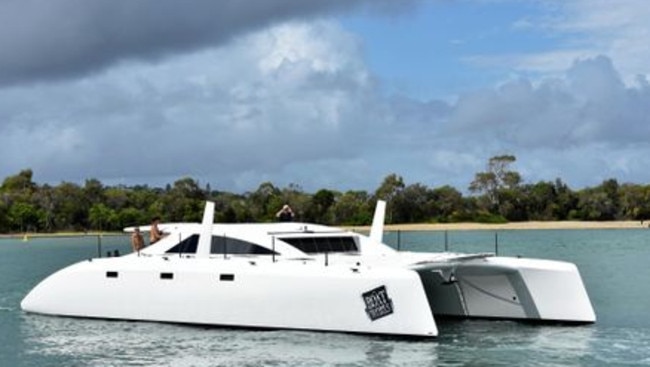 Tony Longhurst's 20m catamaran Kato leaves the Noosa River. Photo: Peter Gardiner