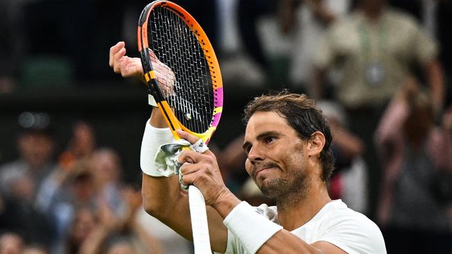 Rafael Nadal applauds as he celebrates winning against Italy's Lorenzo Sonego. Picture: AFP.