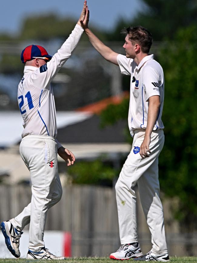 VTCA: Keilor’s A Miles and Matthew Strachan celebrate a wicket. Picture: Andy Brownbill