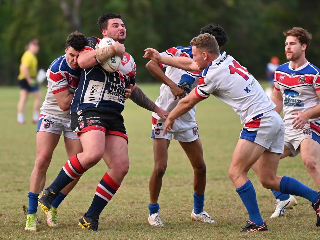 Atherton’s James Coyle is met by the defence. Picture Emily Barker.