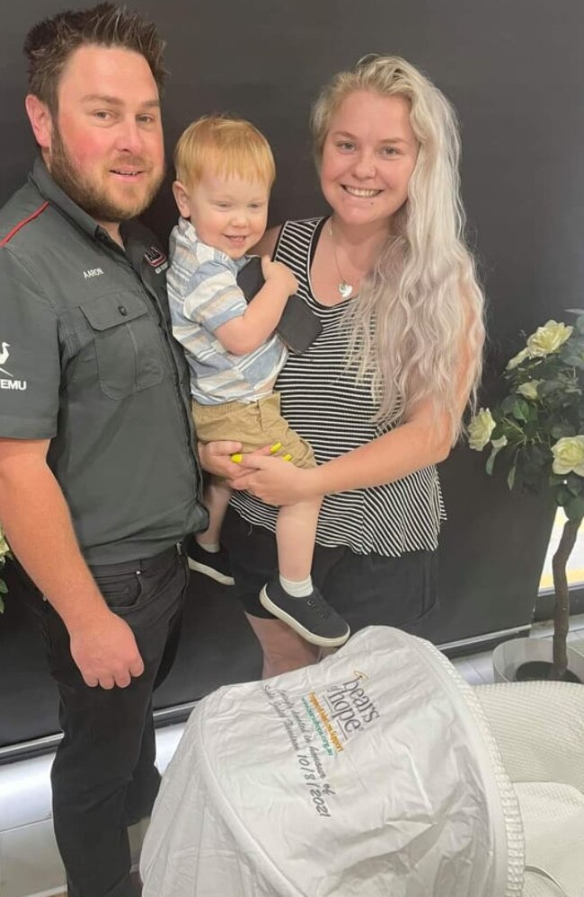 Aaron, Nikki and Jaxon with the cuddle cot they donated to Farewell Funerals of Meadowbrook after raising the money for the special cot through an online fundraiser. Picture: Farewell Funerals